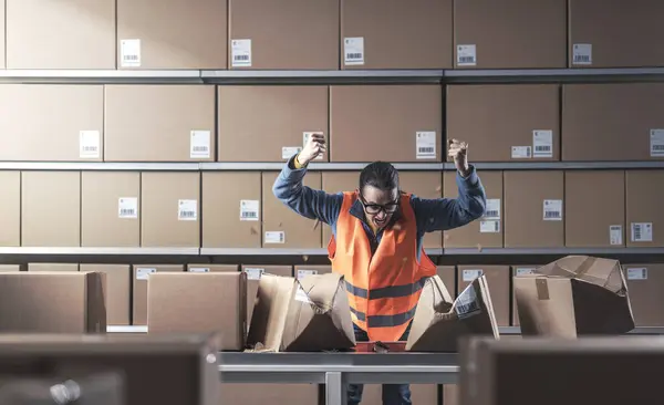 Angry Rebellious Worker Punching Smashing Boxes Conveyor Belt Warehouse She — Stock Photo, Image