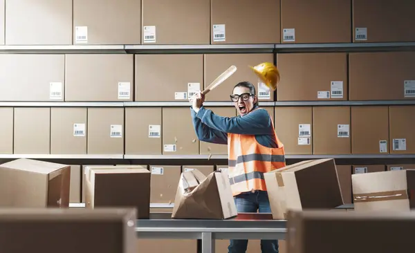 Angry Aggressive Warehouse Worker Hitting Cardboard Boxes Bat Burnout Rage — Stock Photo, Image