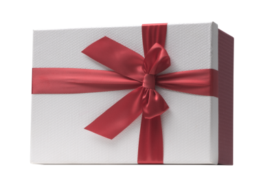 Süslü kırmızı kurdeleli güzel bir Noel hediyesi.