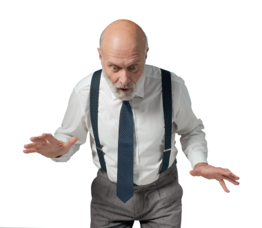 Şok olmuş iş adamı korkunç bir şeye bakıyor.