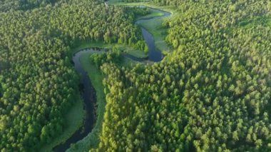 Drone aerial shot of natural river during sunset