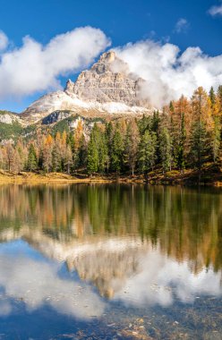 Beautiful autumn landscape in the mountains - lago antorno in italian dolomites  clipart