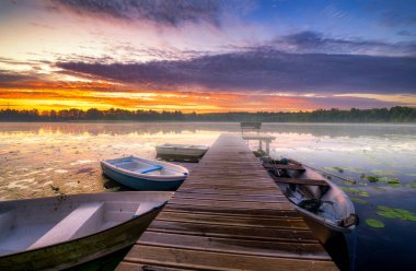 Beautiful summer sunrise over the lake