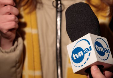 Poland, Poznan - February 26, 2022: Microphone of tvn24 Polska news television. Television interview TVN 24