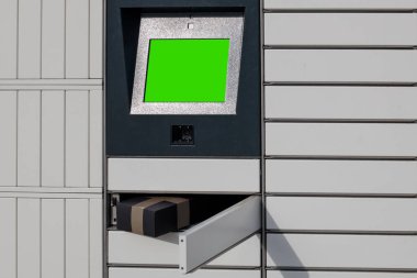 Parcel dispatch machine, terminal screen. Open parcel box. Mock-up