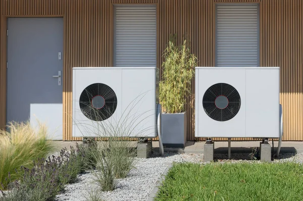 Pair Air Source Heat Pumps Eco Friendly Home Heating Solution Royalty Free Stock Photos