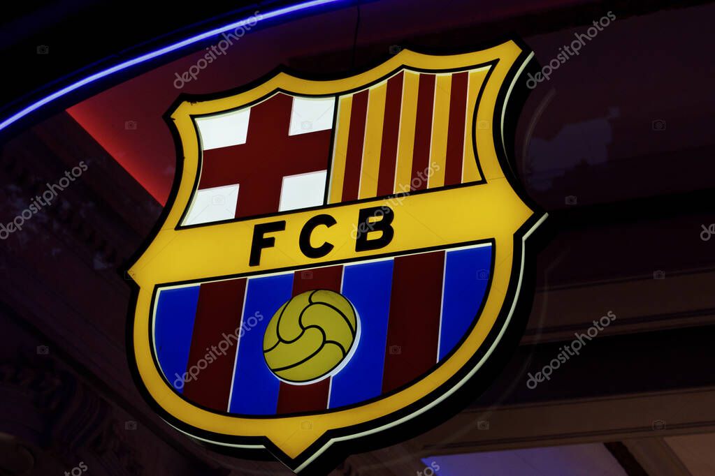Barcelona, Spain - 09 August 2023: FC Barcelona official store showcasing the emblematic logo of the renowned football club.