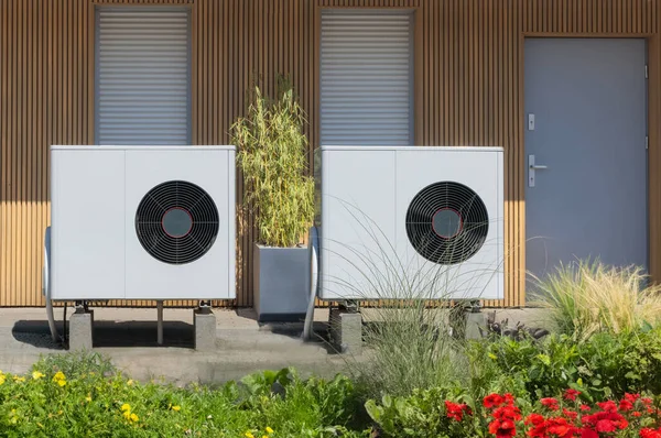 Eco Friendly Dual Air Source Heat Pumps Contemporary Home Stock Photo