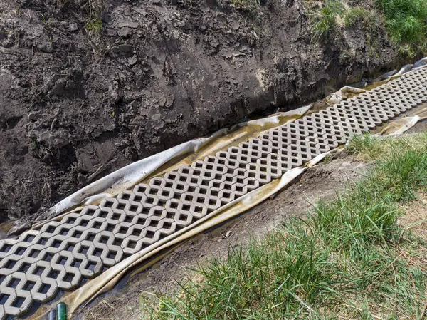 stock image Concrete Drainage Ditch with Grass