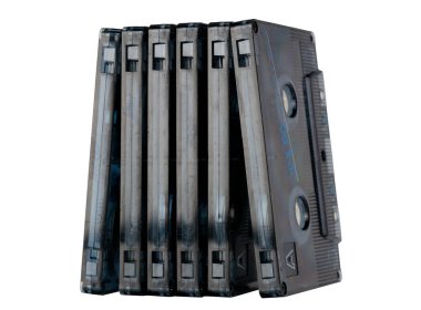 Stack of Vintage Compact Cassette Tapes in a Row clipart