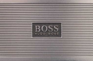 Poznan, Poland. 7 November, 2021. Close up of Hugo Boss brand logo on metal surface. clipart