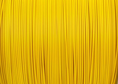 Sarmalanmış Sarı Elektrik Kablosu Kapat