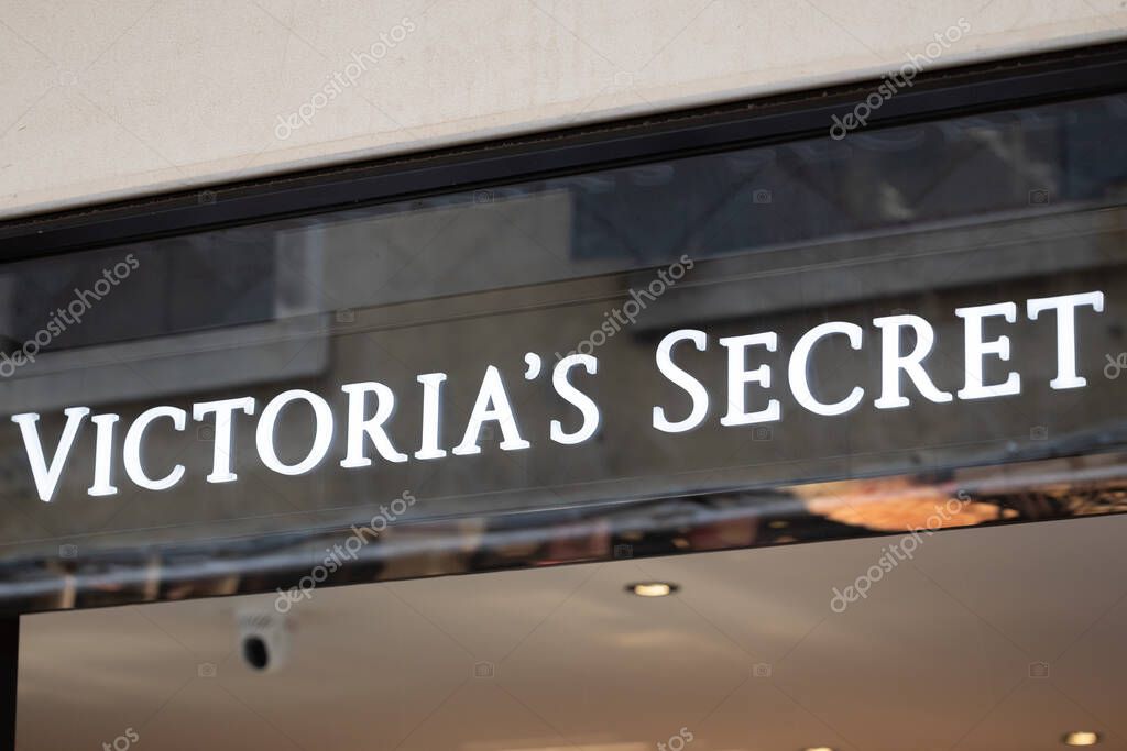 Venice, Italy - April 20 2025: Storefront of Victoria s Secret boutique with illuminated logo in city center