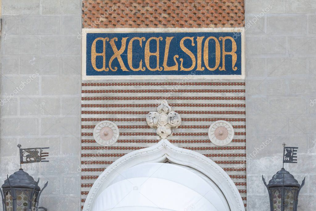 Lido, Italy - April 19 2025: Mosaic Excelsior sign above entrance of iconic luxury hotel on Venice Lido