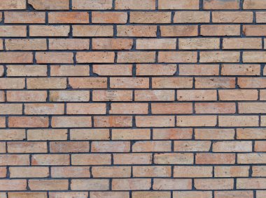 Eski kırmızı ve bej tuğlalı duvar