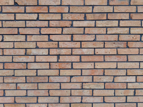 Old red and beige brick wall