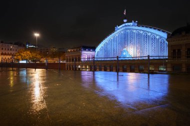 Atocha railway station at night in madrid, Spain. clipart