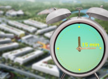 15 dakikalık şehir konsepti, çalan ikiz zilli klasik çalar saat. Seçici Odaklanma. 15 dakikalık bir şehir, günlük ihtiyaçların çoğunun karşılanabildiği yerleşim yeri konseptidir.