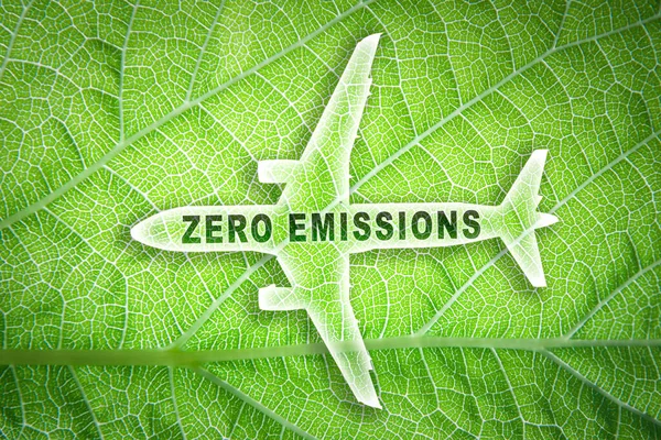 Icona Aeroplano Commerciale Con Parole Zero Emissioni Una Texture Fogliare — Foto Stock