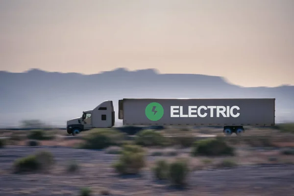 truck on the road with the text electric. Eco friendly and electric powered transportation concept