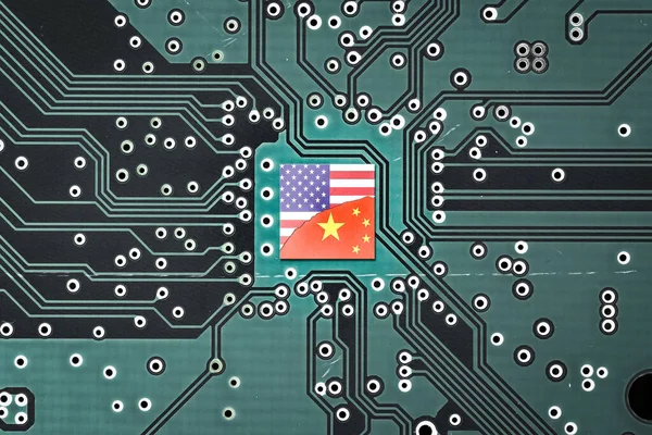 Flag of USA and China on a microprocessor, CPU or GPU microchip on a motherboard. symbolizing war the United States and China tech war. US limits, restricts AI chips sales to China.