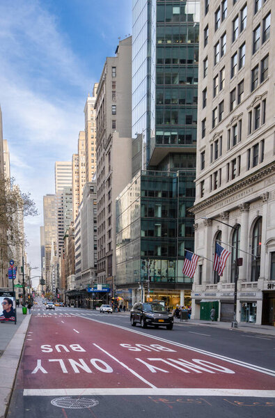 New york, USA. November 17, 2019: New Yorks busy 5th Avenue showcases the citys hustle and bustle with its dedicated bus lane