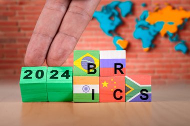 Russia will hold a BRICS summit in Kazan in October 2024. The BRICS strategy is open a partnership and inviting 6 other emerging countries to join the group. Suitable for emphasize the BRICS unity and clipart