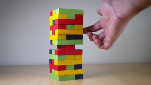 Closeup Image Hand Holding Playing Jenga Tumble Tower Wooden Block — Stock Video