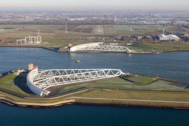 Aerial view Maeslantkering, big storm surge barrier in the Netherlands clipart