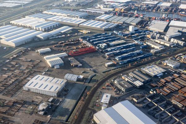 Aerial view Dutch industrial park Moerdijk with harbor and warehouse storage