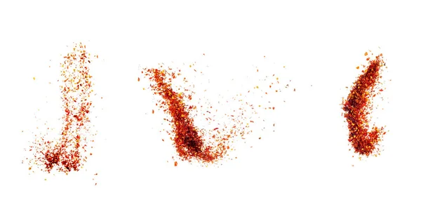 Isolated pepper splashes on a white background. Explosion. Chile. Paprika. Spice. Hot pepper powder. Taste of pepper. Mexican. Element for the design. Flying powder