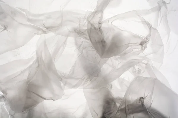 Närbild Plastgenomskinlig Cellofanpåse Vit Bakgrund Texturen Ser Blank Och Glänsande — Stockfoto
