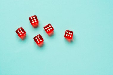 Gaming dice on color background with copy space. clipart