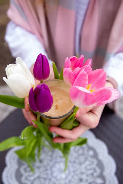 cup of coffee flowers in hands, cafe, flowers, spring tulips
