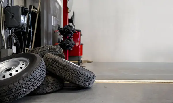 stock image Used Car Tires Stacked in a Garage