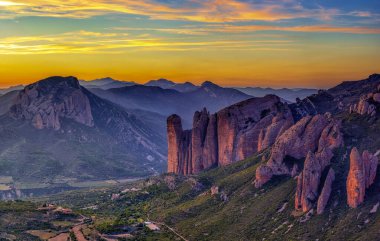 Mallos de Riglos rocks at sunset, Huesca province, Aragon, Spain. clipart