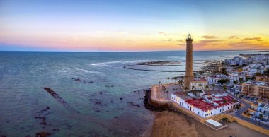 Drone view of the Chipiona lighthouse at dawn in the province of Cadiz. Spain. clipart