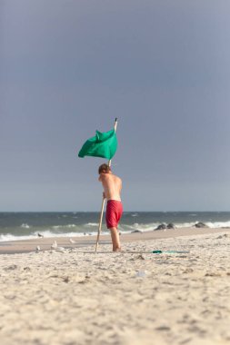 Sea Bright, New Jersey - August 3, 2017: Lifeguards from Sea Bright and surrounding beach clubs gather to compete in a lifeguard competition clipart