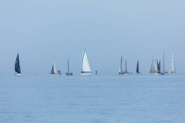 South Amboy, New Jersey - August 14, 2024: Sailabots race on the Raritan Bay between New Jersey and Staten Island during the beatufiul golden hour clipart