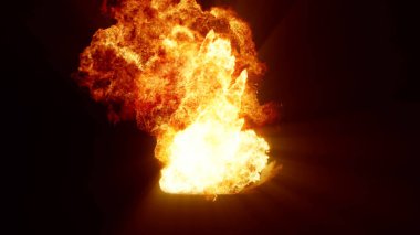 3D rendering of an impressive intense explosion on a black background. Composition of a detonating bright colorful explosion, shock wave and puffs of smoke filling the space