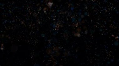 Parlak renkli parçacıklar halinde konfeti zarif bir şekilde iniyor ve havada dönüyor. Neşeli ve şık bir sunum için de ideal bir arka plan. Döngülü