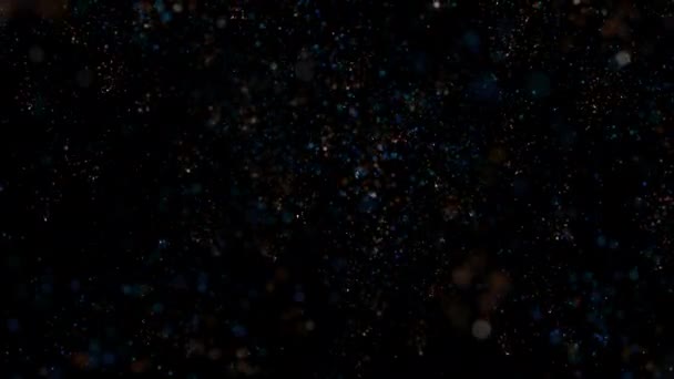 Confete Brilhantemente Colorido Forma Partículas Elegantemente Desce Girando Fundo Festivo — Vídeo de Stock