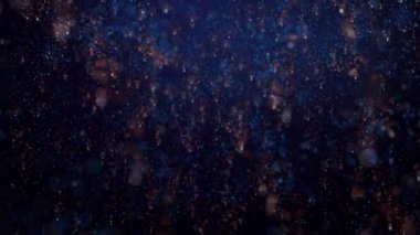 Parlak renkli parçacıklar halinde konfeti zarif bir şekilde iniyor ve havada dönüyor. Neşeli ve şık bir sunum için de ideal bir arka plan. Döngülü