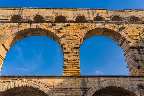 stock image Two arch from Pont du Gard three-tiered aqueduct at the river Gardon, Provence