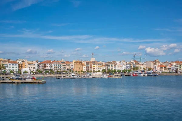 View of Cambrils Port and city waterfront with Torre del Port and boats at the Costa Doraada, Tarragona