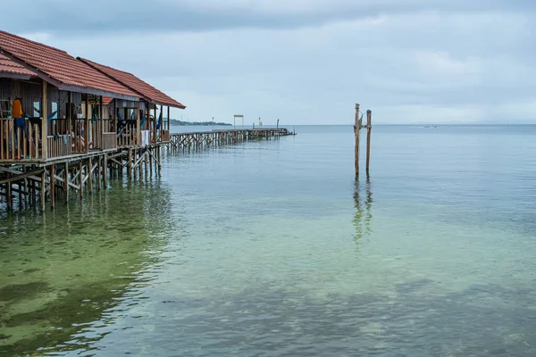 Water houses at the coastline of Saporkren on Waisai island, Raja Ampat, Indonasia