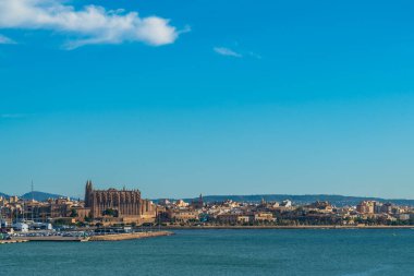 Palma de Majorca, Balearic Islands, Spain, - November 11.2023 : Palma de Mallorca harbour view with cruise ships and the cathedral in background clipart