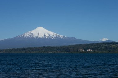 volcano osorno viewpoints blue water cabulco villarica chile volcan thaw river snow on top chile puerto varas puerto mont pucon villarica osorno blue water blue sky sunset
