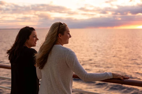 Two Attractive Middle Aged Women Enjoying Sunset View Deck Cruise — Stock Photo, Image