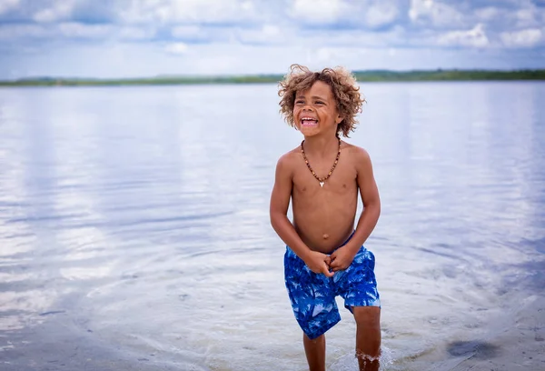 Candid Portrait One Cool Kid Hanging Out Swimsuit Beach Smiling — Foto de Stock